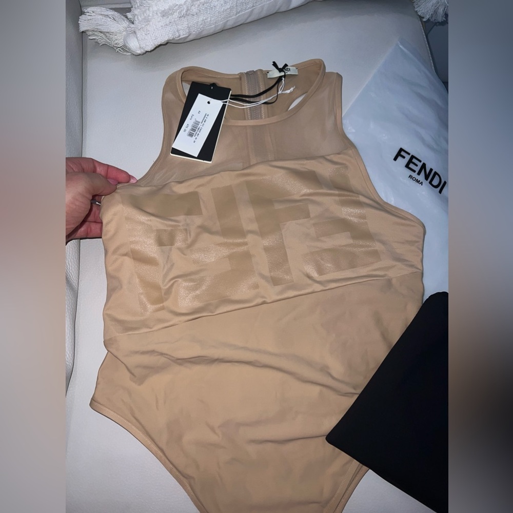Fendi women swimsuit beige size 44. Never worn. With pouch.
